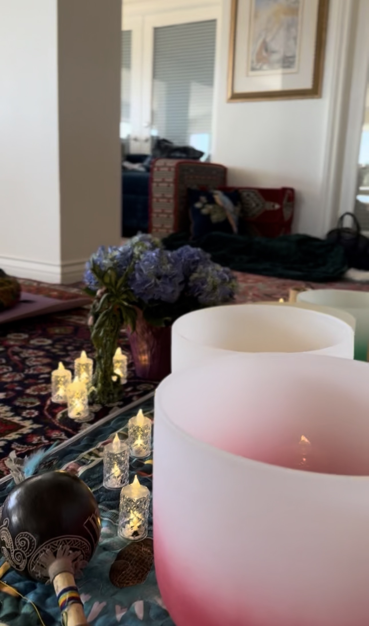 Crystal singing bowls and candles set for a sound meditation evening