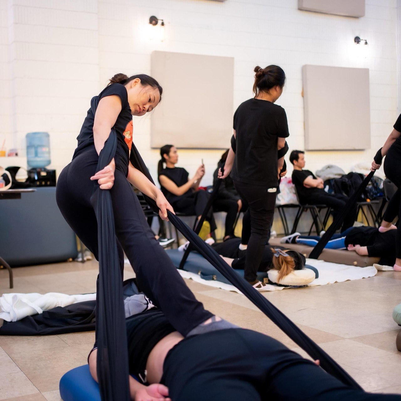 Daroma Wellness — Floor-based assisted stretching, fully clothed